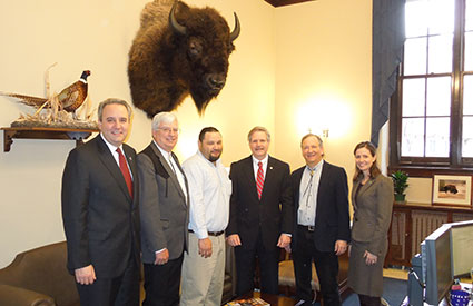 Senator Hoeven (ND) [3rd from right], a cosponsor of legislation to make bison the National Mammal of the United States, met with representatives of the InterTribal Buffalo Council, National Bison Association, and Wildlife Conservation Society. (Feb. 2012) <b>©WCS</b>